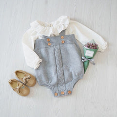 Knitted baby onesies