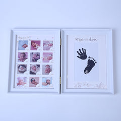 Newborn hand and foot print mud