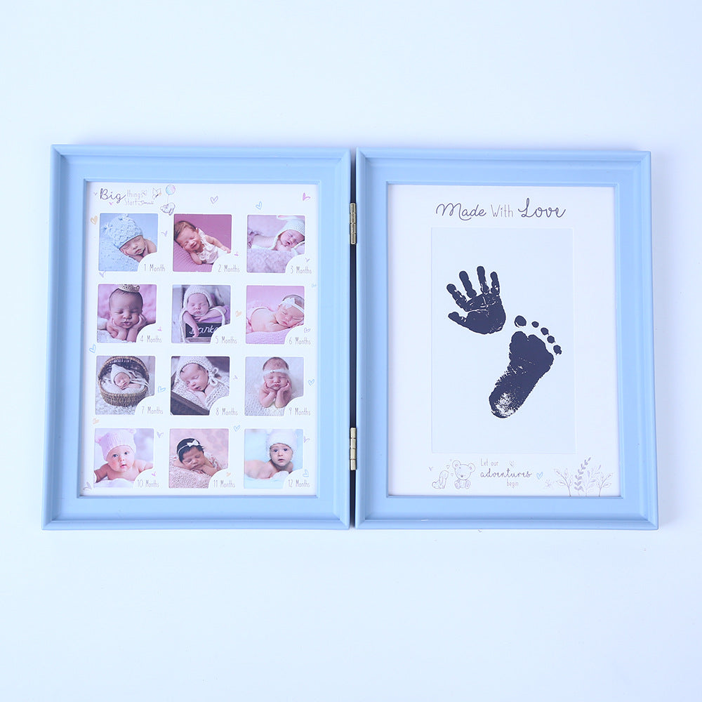 Newborn hand and foot print mud