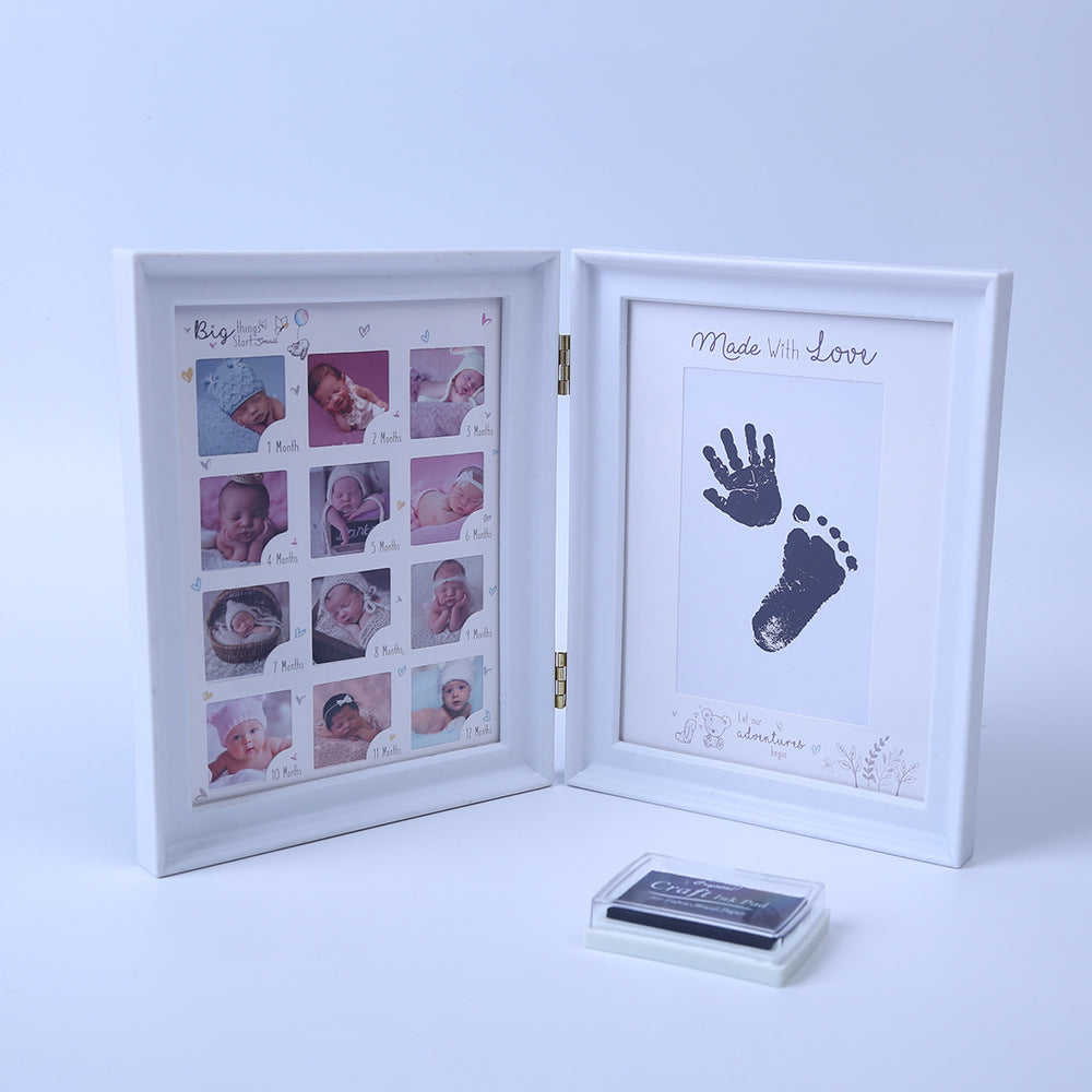 Newborn hand and foot print mud