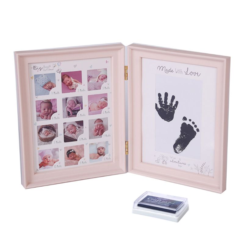Newborn hand and foot print mud