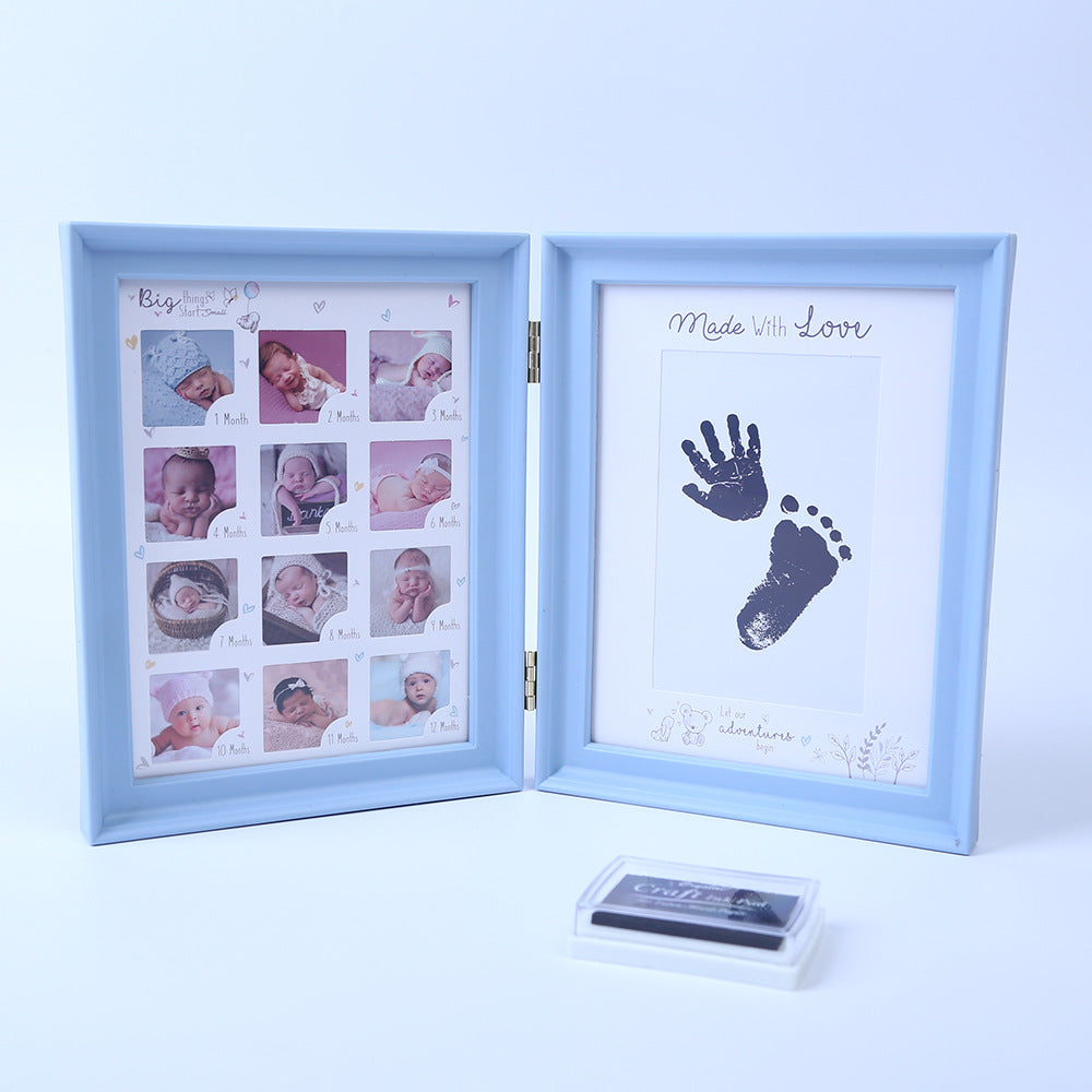 Newborn hand and foot print mud